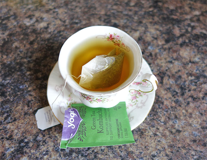 Yogi Green Tea Kombucha in a teacup